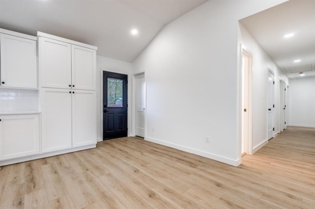109 East 5th Street Prosper, TX 75078 - Photo 8 of 25 wooden floor in an empty room