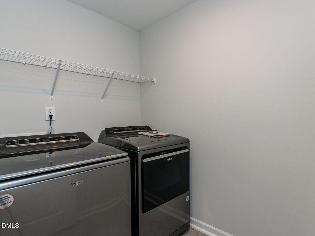 3112 Ranger Drive Durham, NC 27703 - Photo 14 of 35 a view of storage and utility room with racks on the wall