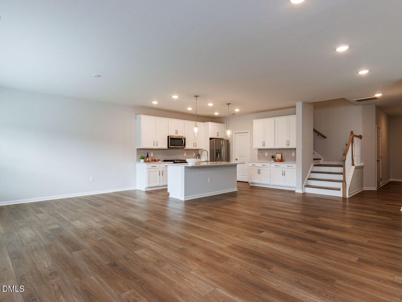 3112 Ranger Drive Durham, NC 27703 - Photo 26 of 35 a view of kitchen with wooden floor and kitchen