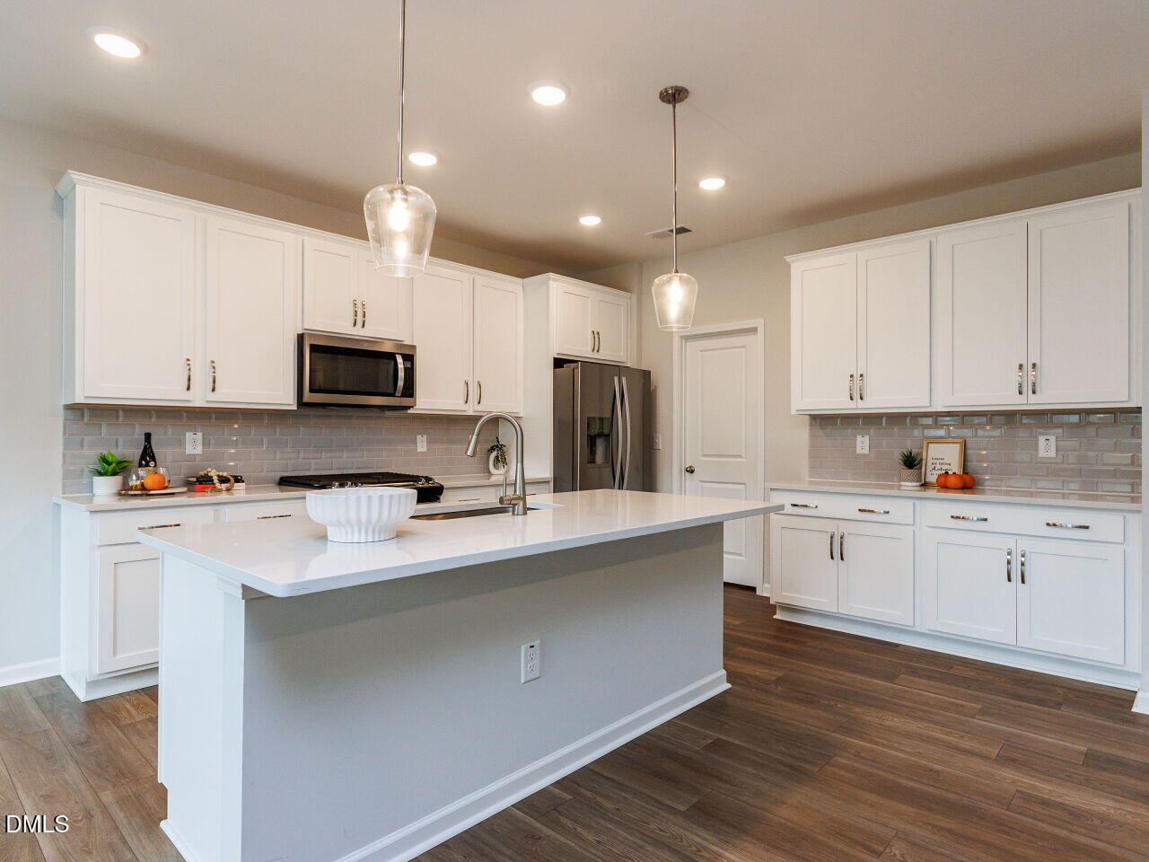3112 Ranger Drive Durham, NC 27703 - Photo 7 of 35 a kitchen with appliances a sink and cabinets