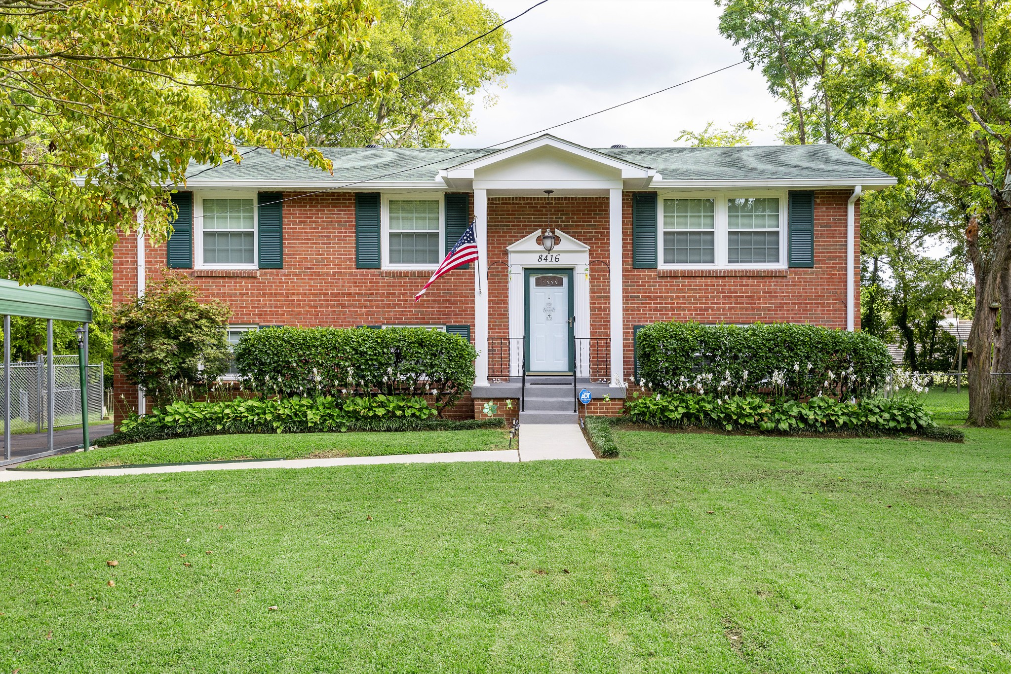8416 Terry Lane Hermitage, TN 37076 - Photo 1 of 24 a front view of a house with a yard