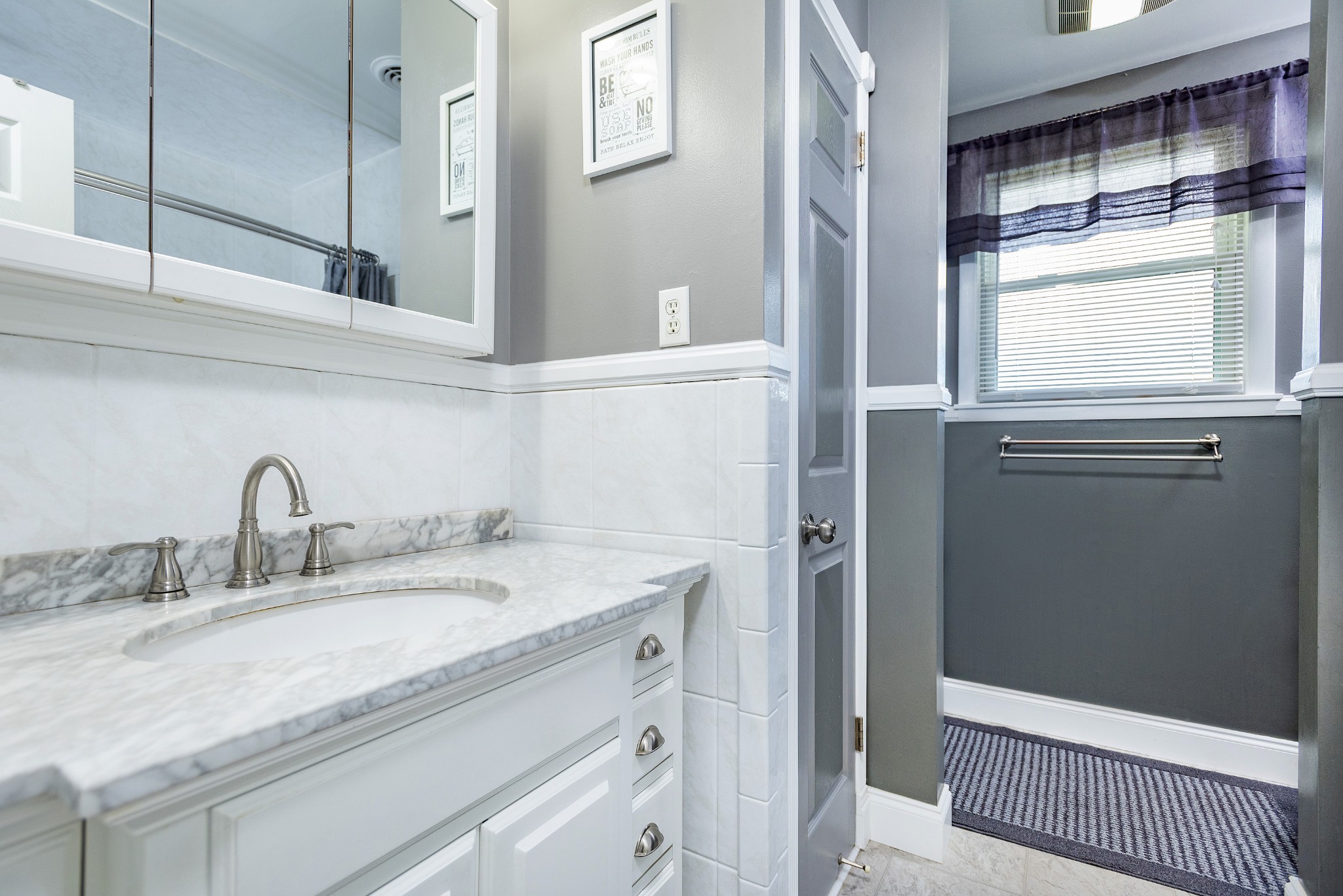 8416 Terry Lane Hermitage, TN 37076 - Photo 11 of 24 a bathroom with a sink and a mirror