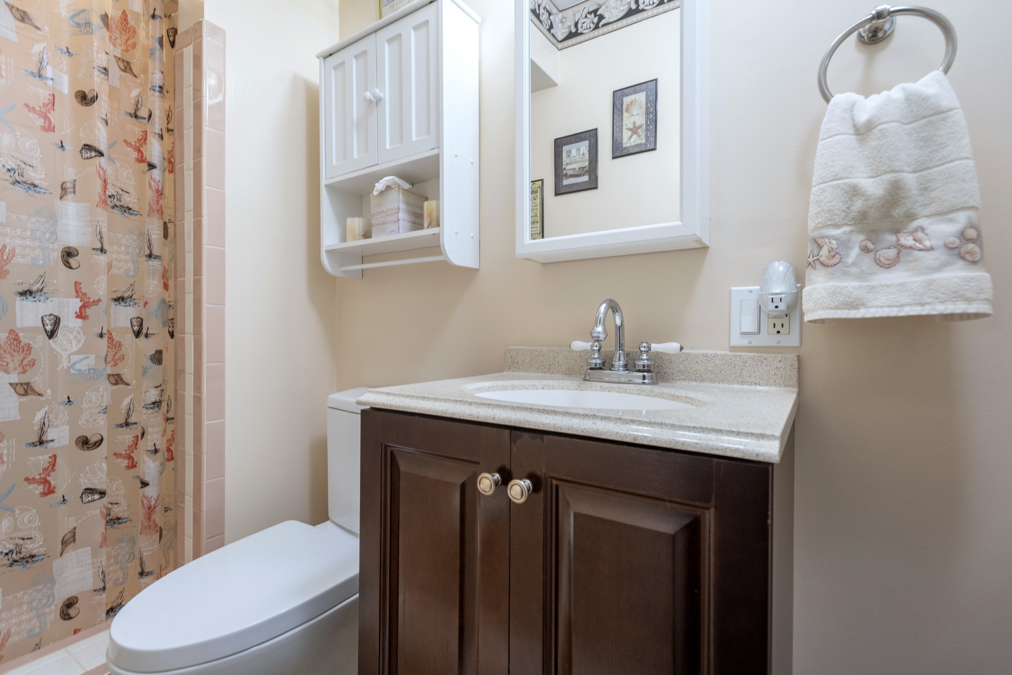 8416 Terry Lane Hermitage, TN 37076 - Photo 17 of 24 a bathroom with a granite countertop sink a toilet and a mirror
