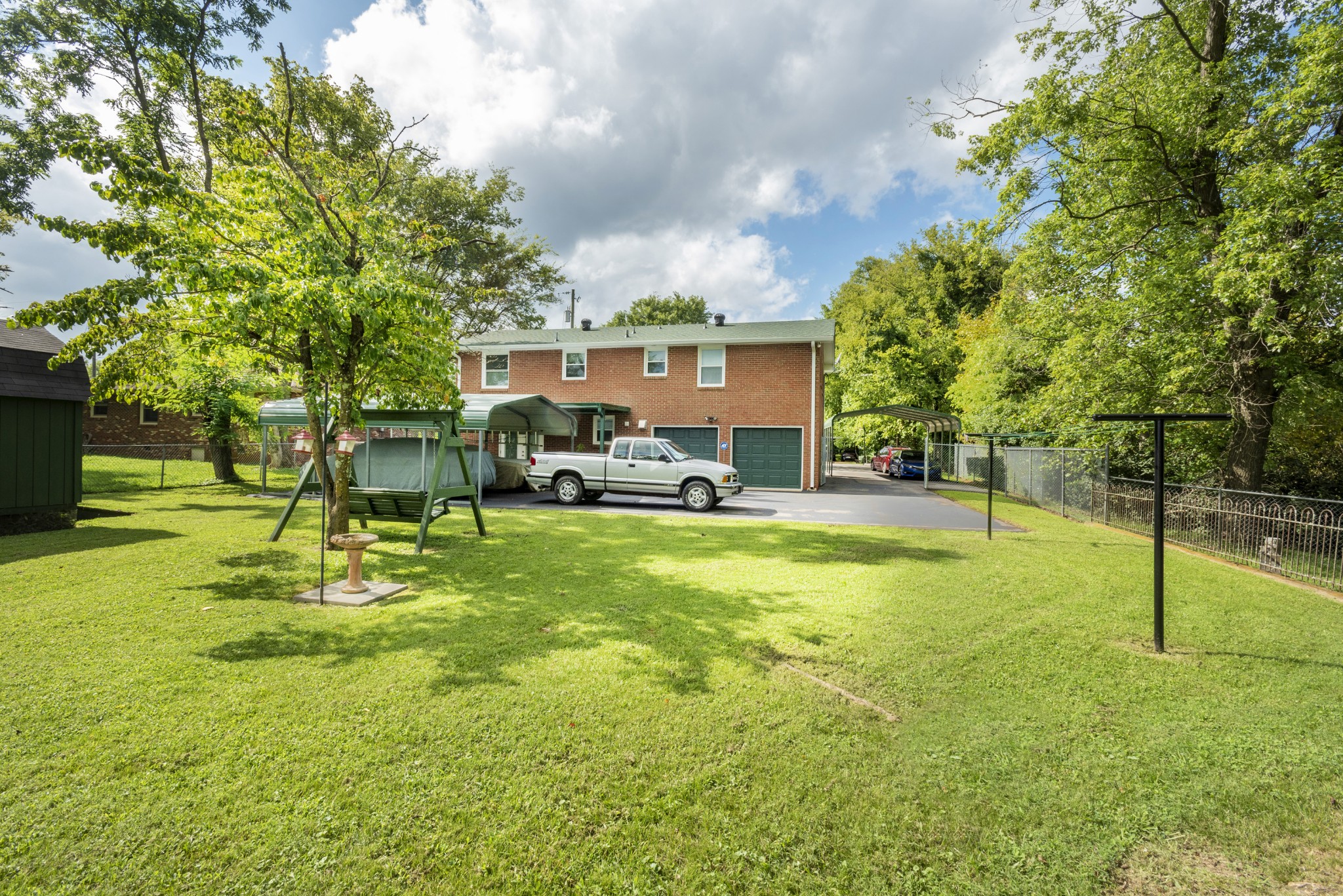 8416 Terry Lane Hermitage, TN 37076 - Photo 20 of 24 a view of a yard with a slide