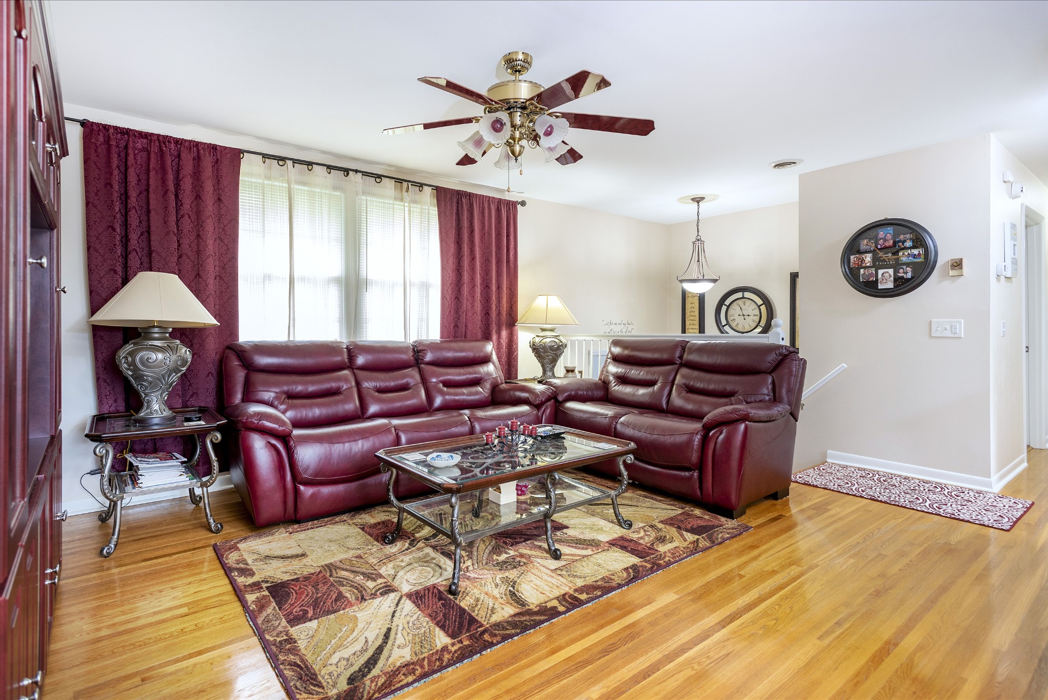 8416 Terry Lane Hermitage, TN 37076 - Photo 3 of 24 a living room with furniture a table and a chandelier