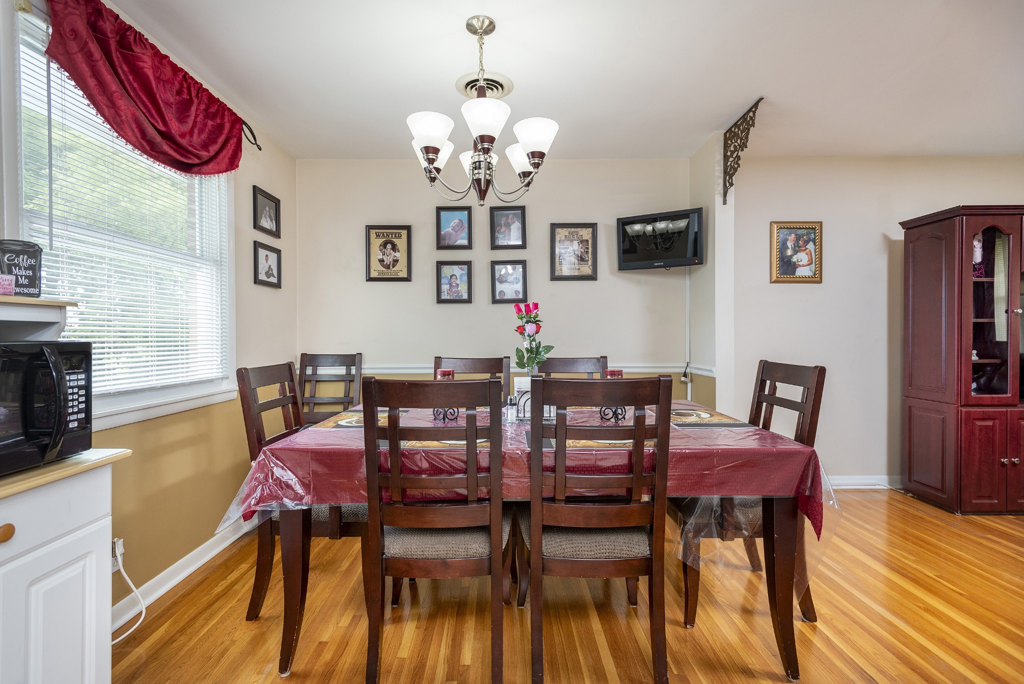 8416 Terry Lane Hermitage, TN 37076 - Photo 5 of 24 a view of a dining room with furniture and wooden floor