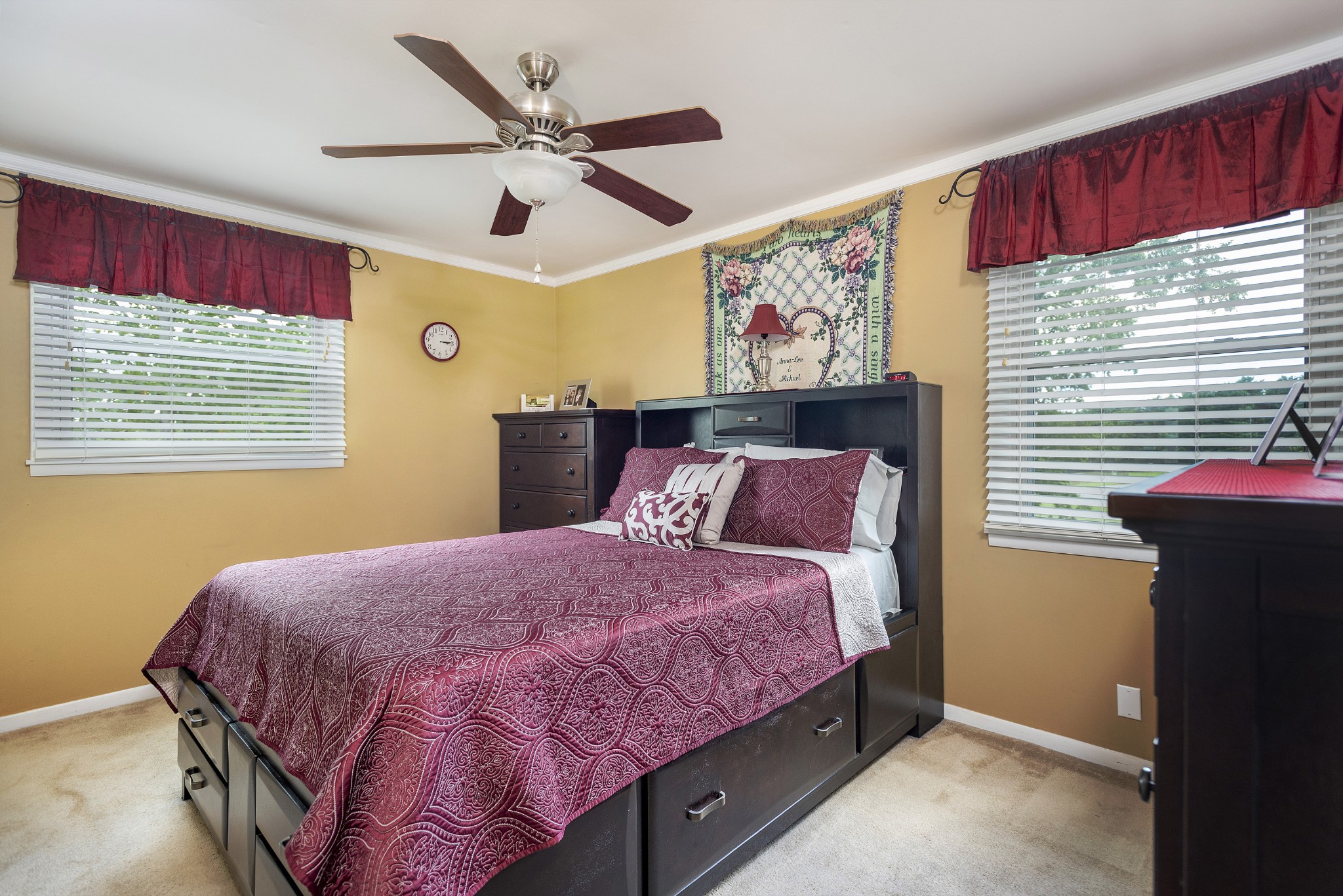 8416 Terry Lane Hermitage, TN 37076 - Photo 8 of 24 a bedroom with a large bed and a window