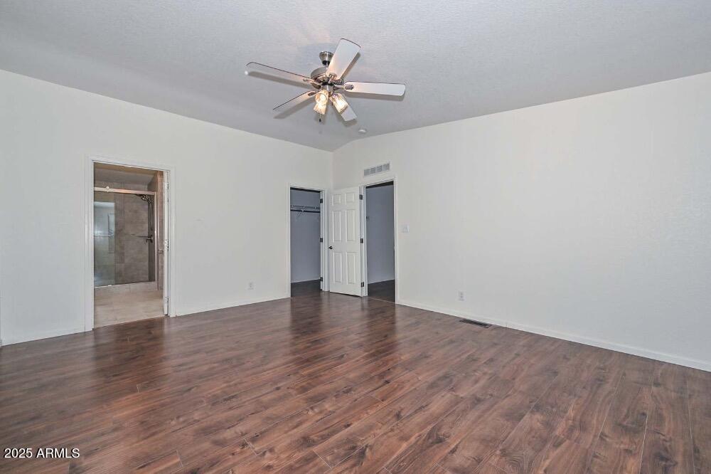 16101 North El Mirage Road, Unit 322 El Mirage, AZ 85335 - Photo 21 of 50 a view of an empty room with wooden floor