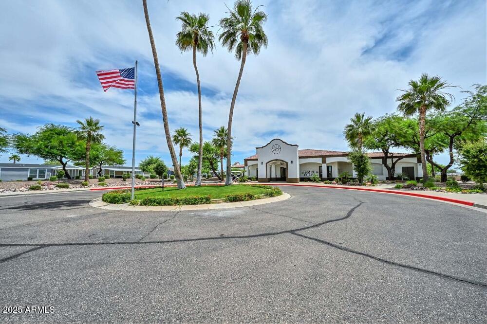 16101 North El Mirage Road, Unit 322 El Mirage, AZ 85335 - Photo 44 of 50 a front view of multiple houses with yard