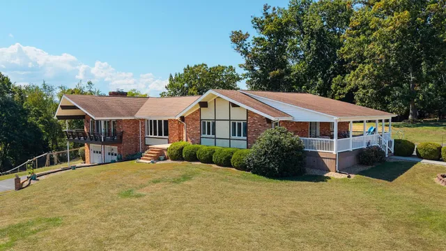 a kitchen with a sink a stove and cabinets