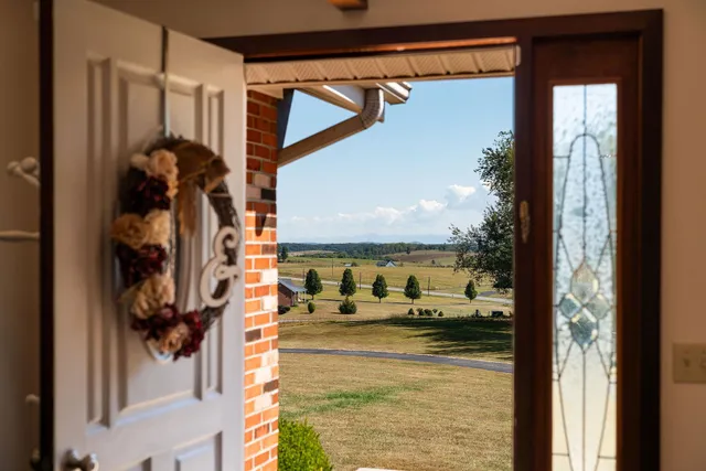 a kitchen with granite countertop a stove and a microwave