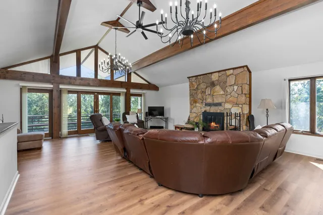 a bedroom with a bed dresser and a window