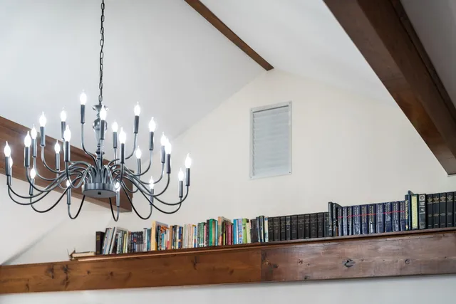a white toilet sitting next to a shower curtain