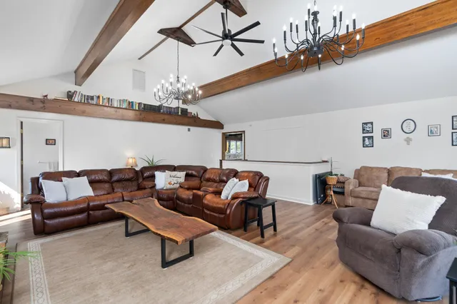 a bathroom with a sink vanity and a mirror