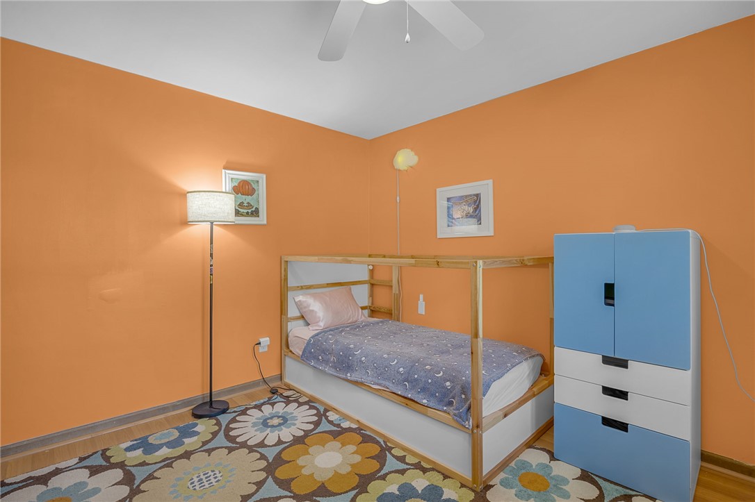 1002 Berkeley Drive Clemson, SC 29631 - Photo 12 of 23 This cozy bedroom features a practical ceiling fan, providing comfort and style to the space.