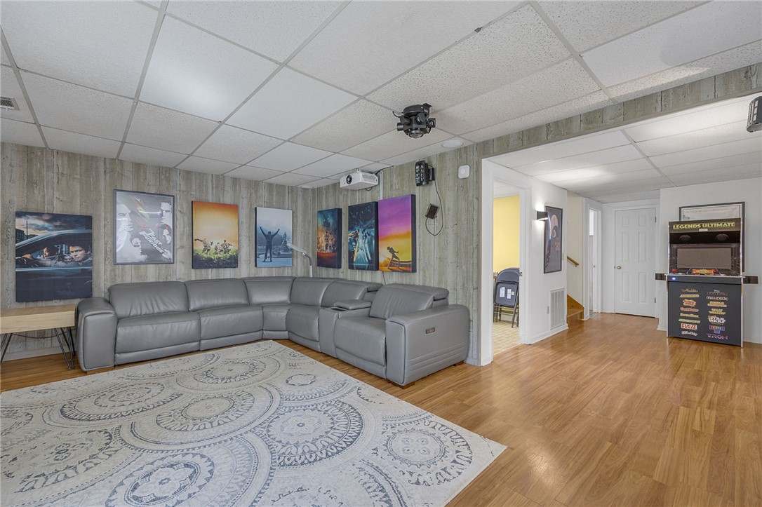 1002 Berkeley Drive Clemson, SC 29631 - Photo 14 of 23 This versatile living space features wood flooring and recessed lighting, offering comfort and style.