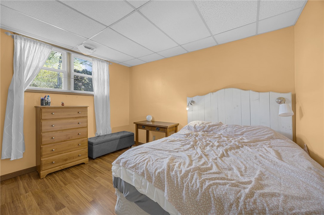 1002 Berkeley Drive Clemson, SC 29631 - Photo 17 of 23 This inviting bedroom features rich hardwood flooring and abundant natural light.