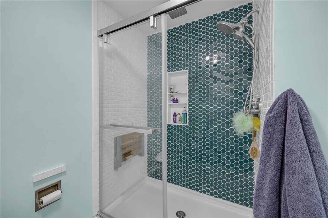 1002 Berkeley Drive Clemson, SC 29631 - Photo 9 of 23 This modern bathroom features a stylish shower with honeycomb and subway tile accents.