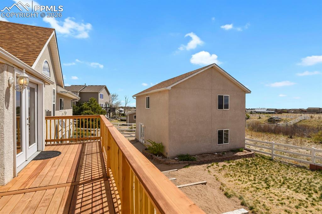 11505 Salinas Road Peyton, CO 80831 - Photo 30 of 37 a view of balcony and kitchen