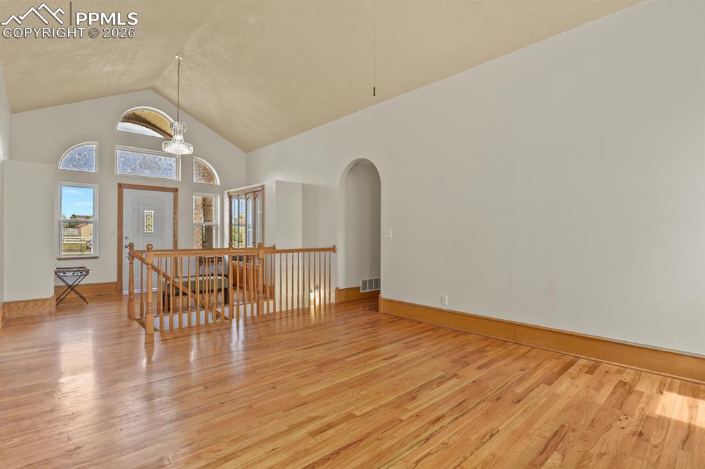 11505 Salinas Road Peyton, CO 80831 - Photo 6 of 37 a view of a livingroom with furniture and wooden floor