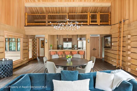 a view of a patio with table and chairs
