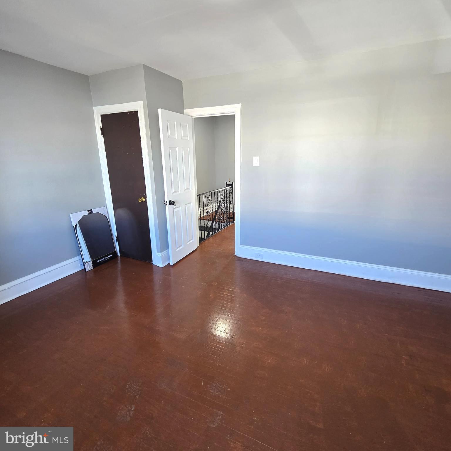 2634 South Daggett Street Philadelphia, PA 19142 - Photo 19 of 28 a view of livingroom with furniture and wooden floor