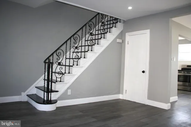 a view of entryway with wooden floor