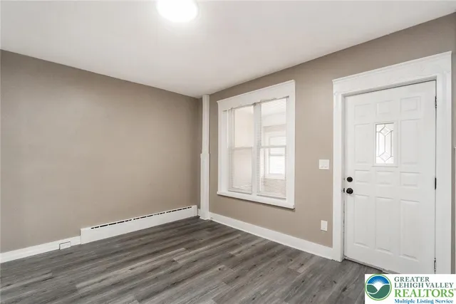 a kitchen with stainless steel appliances granite countertop a stove a sink dishwasher and a refrigerator