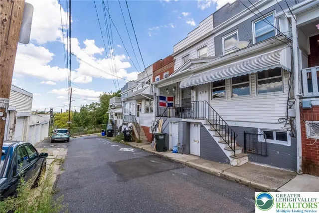 a view of a house with a patio