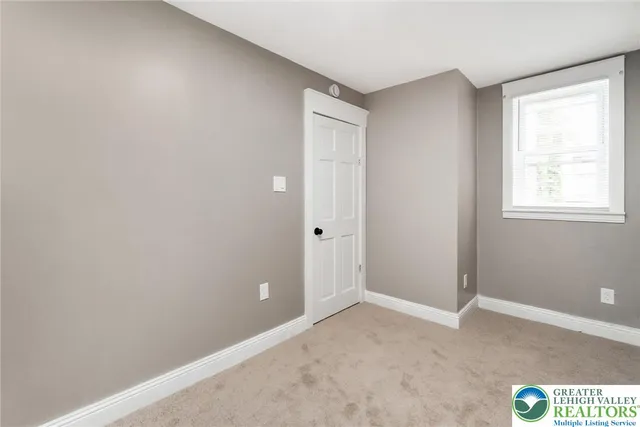 an empty room with a window