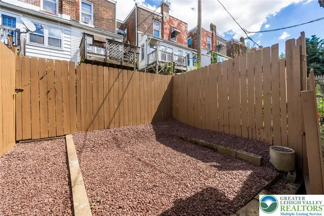 a view of a door and a window