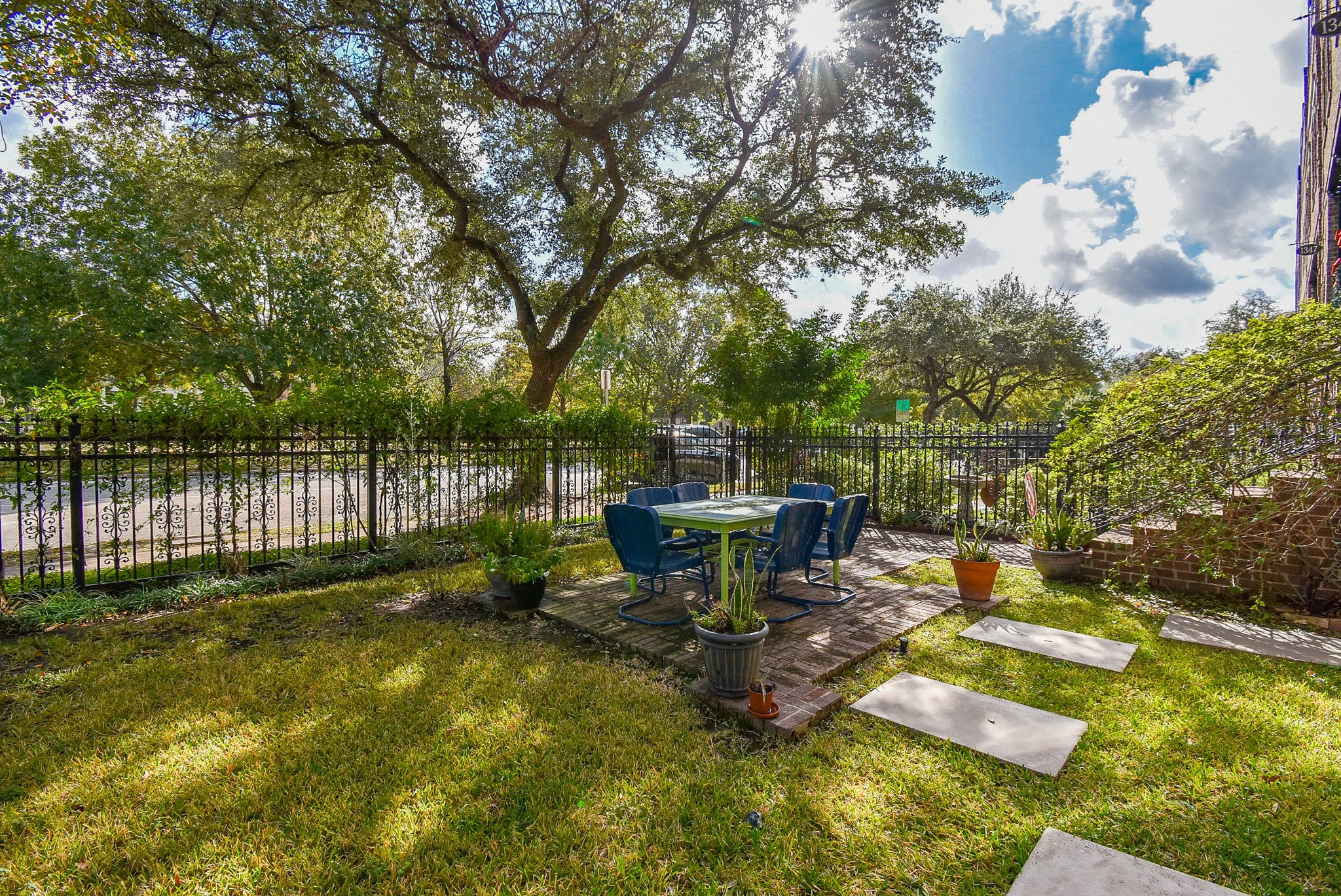 1349 Heights Boulevard, Unit B Houston, TX 77008 - Photo 2 of 32 a view of a backyard with sitting area