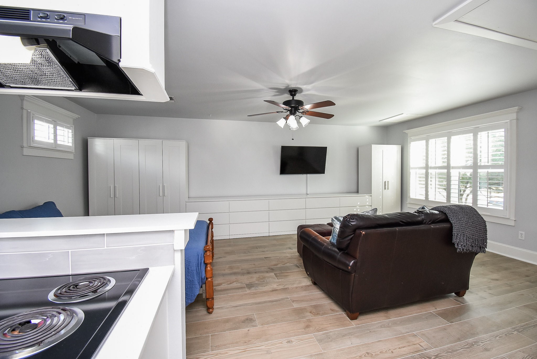 1349 Heights Boulevard, Unit B Houston, TX 77008 - Photo 21 of 32 a living room with furniture and a fireplace
