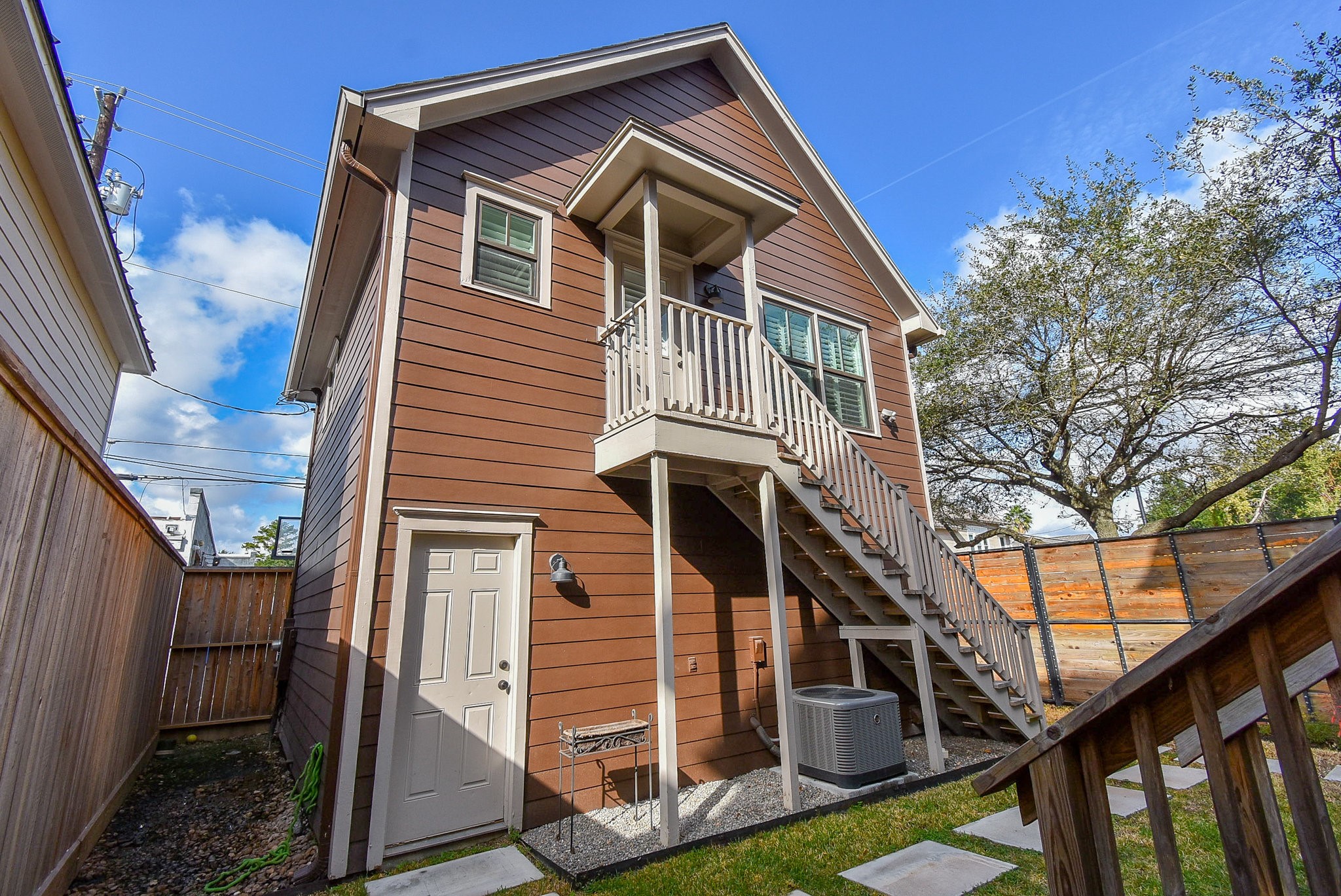 1349 Heights Boulevard, Unit B Houston, TX 77008 - Photo 27 of 32 a front view of a house with a yard