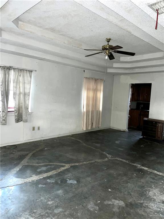 968 Humberto Street Roma, TX 78584 - Photo 3 of 11 a view of empty room with windows