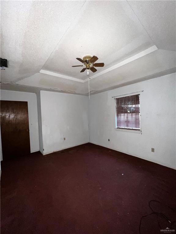 968 Humberto Street Roma, TX 78584 - Photo 5 of 11 a view of a livingroom with a ceiling fan and window