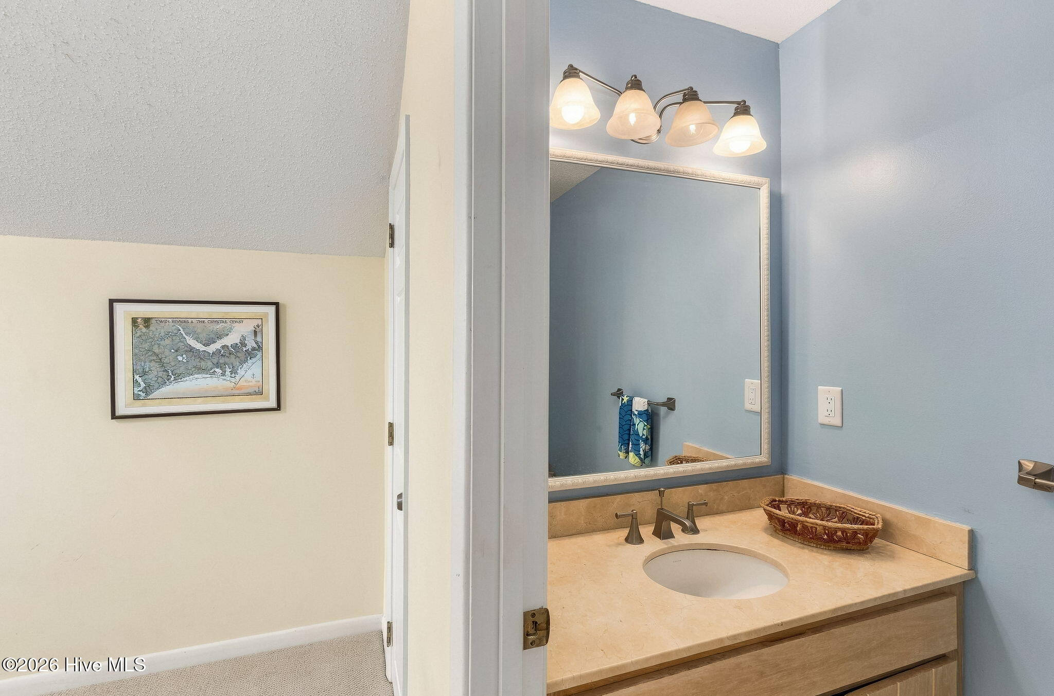 579 Coral Ridge Road Pine Knoll Shores, NC 28512 - Photo 23 of 67 Upstairs Powder Room