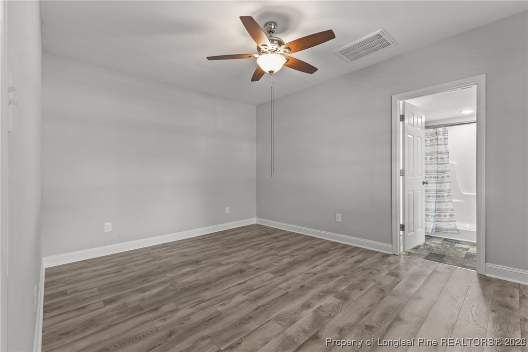502 North Stewart Street Raeford, NC 28376 - Photo 17 of 48 wooden floor in an empty room