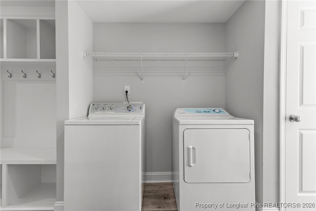 502 North Stewart Street Raeford, NC 28376 - Photo 23 of 48 a utility room with dryer and washer