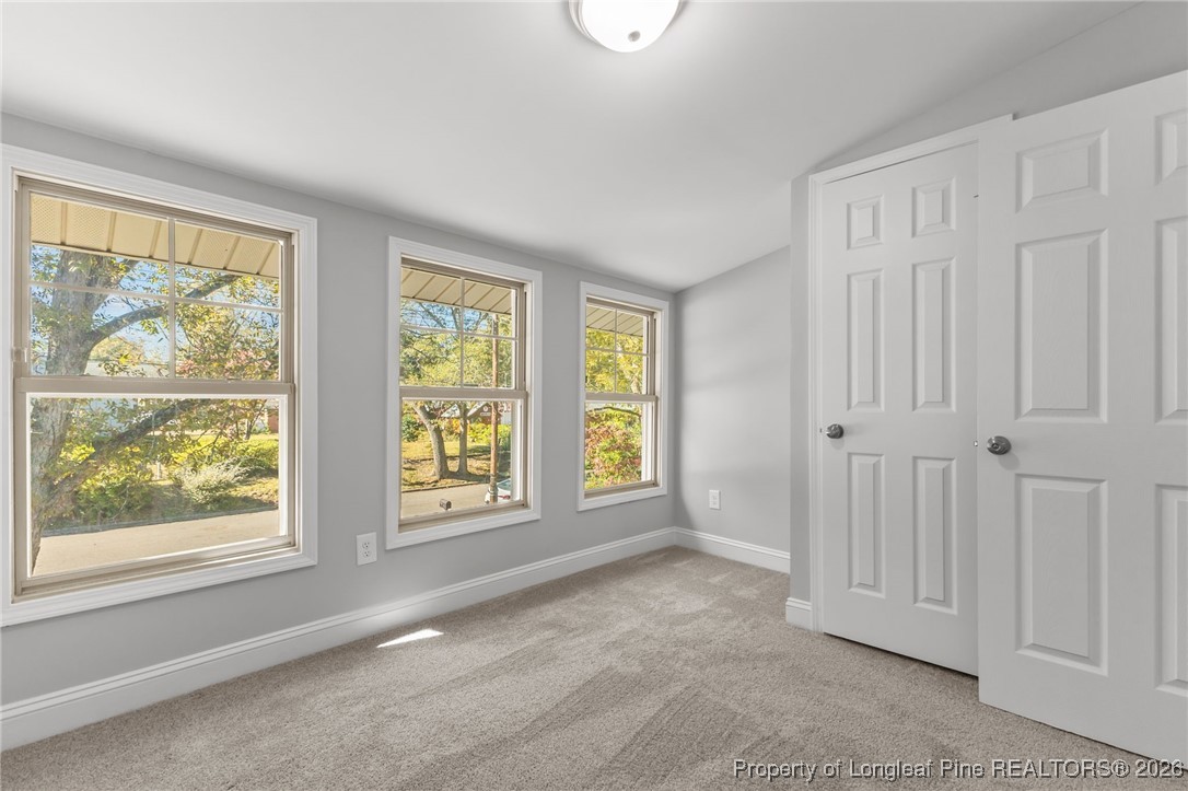 502 North Stewart Street Raeford, NC 28376 - Photo 33 of 48 a view of an empty room with a window