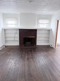 a living room with a fireplace
