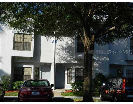 5100 Burchette Road, Unit 3804 Tampa, FL 33647 - Photo 1 of 1 a couple of cars parked in front of a house