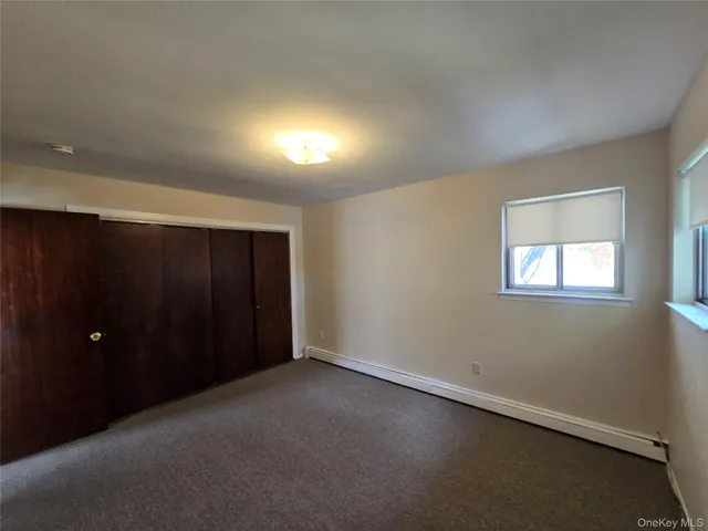 a front view of a house with yard