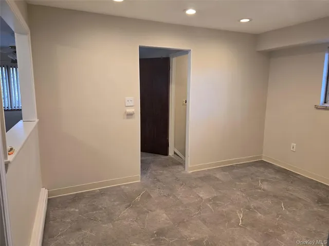 an empty room with an entryway