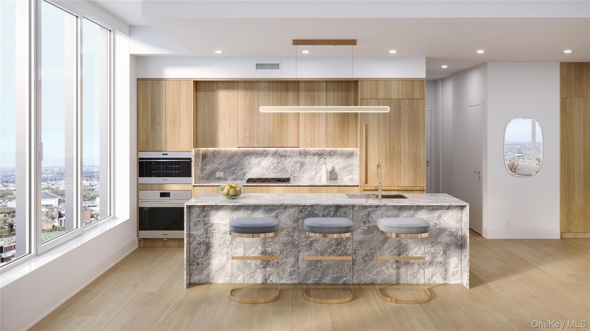 138-18 Northern Boulevard, Unit 11F Queens, NY 11354 - Photo 2 of 12 a living room with stainless steel appliances granite countertop a couch and a large window