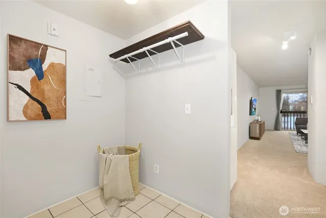 a view of a hallway with closet