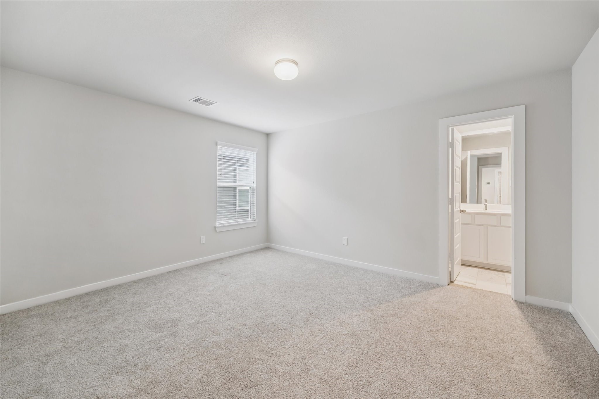 2138 Reed Cave Lane Spring, TX 77386 - Photo 16 of 23 a view of an empty room and a window