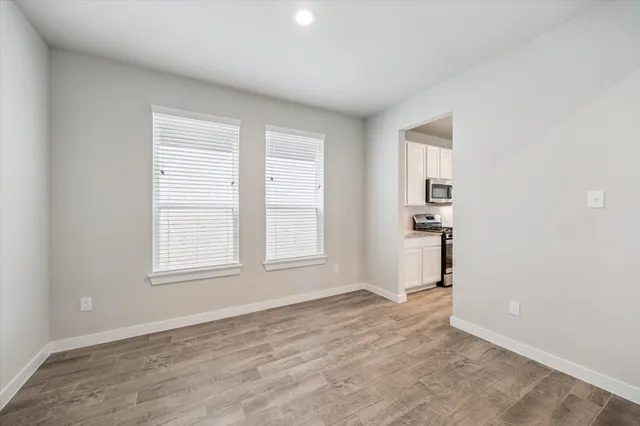 an empty room with windows