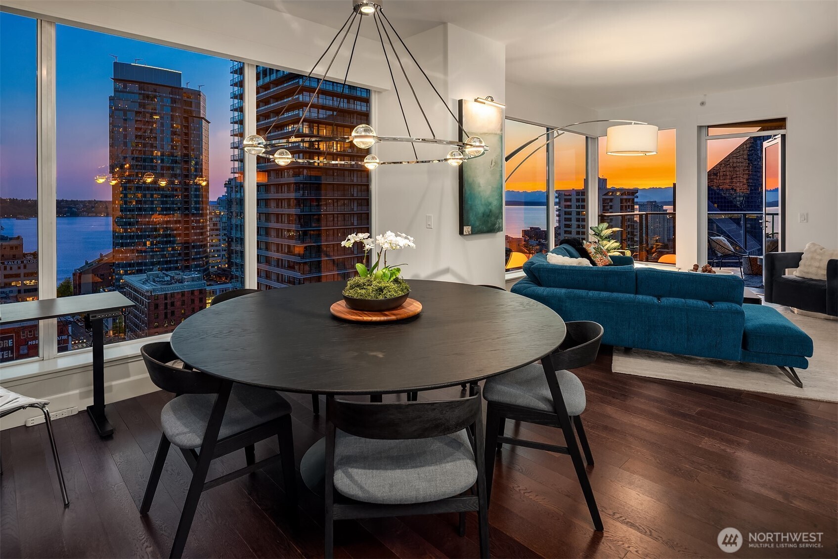 1920 4th Avenue, Unit 2202 Seattle, WA 98101 - Photo 12 of 35 a view of a dining room with furniture window and outside view