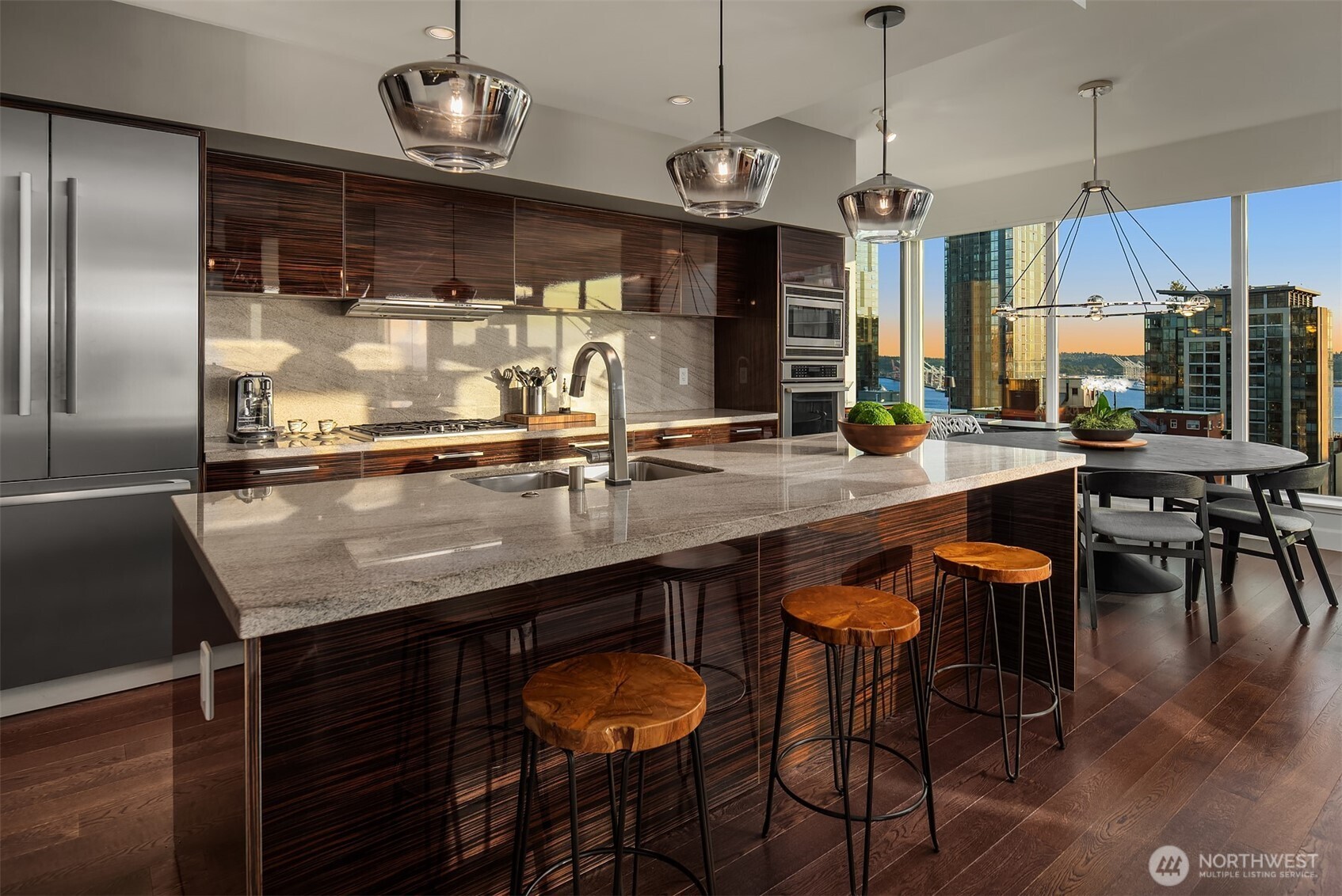 1920 4th Avenue, Unit 2202 Seattle, WA 98101 - Photo 15 of 35 a kitchen with a counter space cabinets and appliances